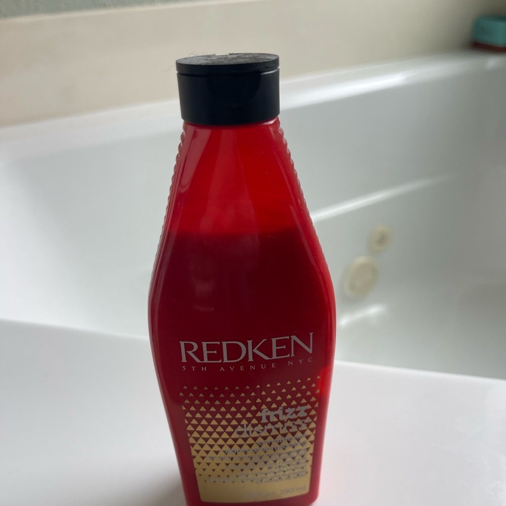 Redken Vibrant Red and Gold Hair Care Bottle
